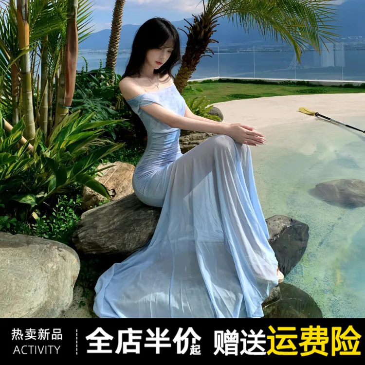 2025新款法式蓝色一字肩薄纱连衣裙子女夏季海边度假气质包臀长裙