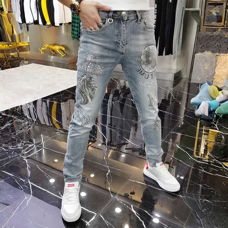 春秋新款欧洲站牛仔裤男重工烫钻印花潮牌帅气休闲修身小脚长裤