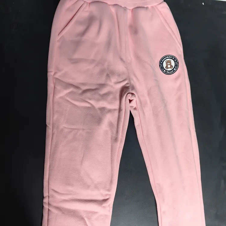 儿童冬季加绒加厚一体摇粒绒保暖运动长裤