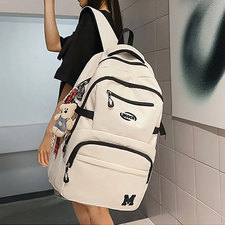 书包男初中高中学生潮流减负护脊双肩包女大容量旅行轻便电脑背包