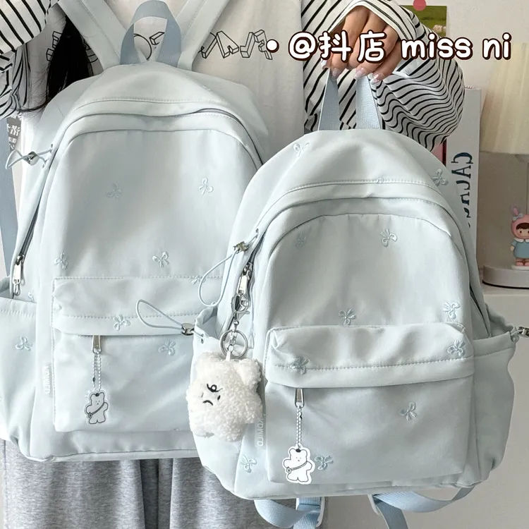 书包女大学生日系简约百搭纯色蝴蝶结背包初高中生轻便旅行双肩包