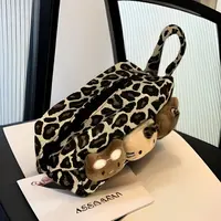 辣妹豹纹黑皮新款手提包大容量化妆包女便携通勤旅行笔袋收纳袋