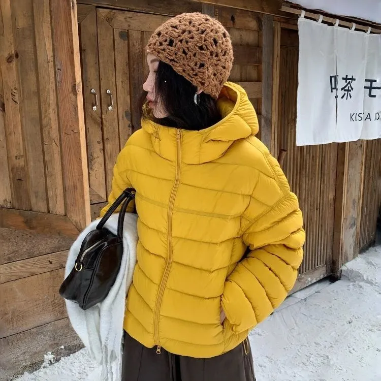 排骨羽绒服2025冬季白鸭绒新款泡芙感宽松连帽超轻保暖短款女外套