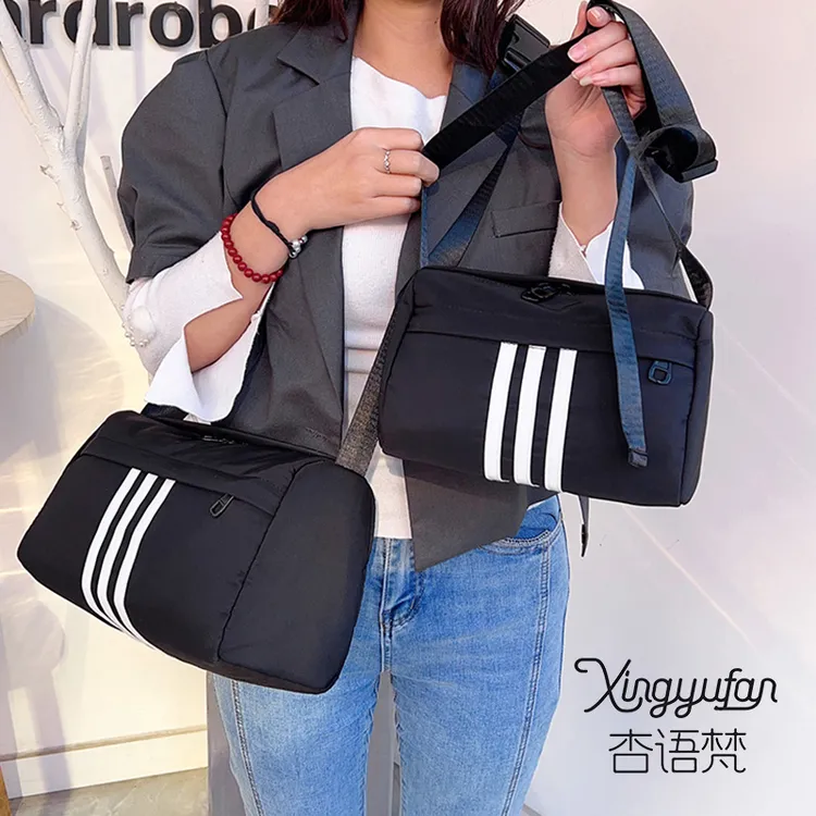 杏语梵OL通勤布包单根防水单肩水洗休闲包单肩包运动风印花
