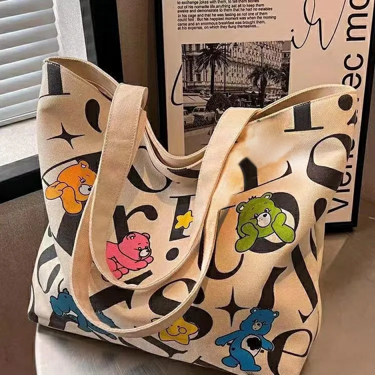 学生帆布包女大容量托特通勤包百搭印花妈咪包手提购物单肩包