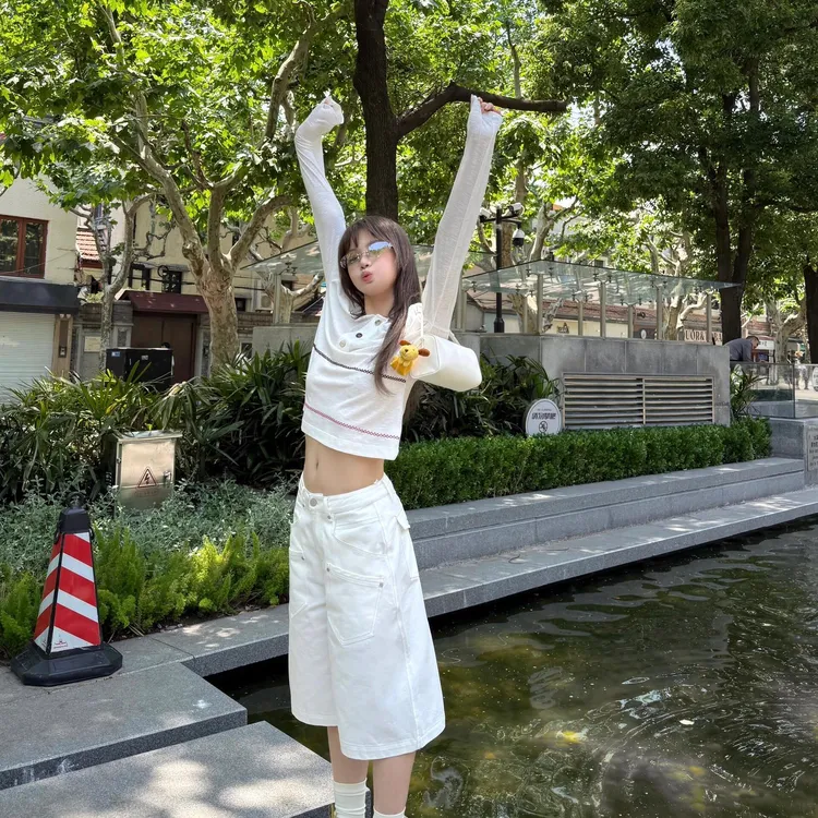 简约慵懒风圆领套头纽扣长袖T恤2025夏季新款宽松防晒显瘦上衣女