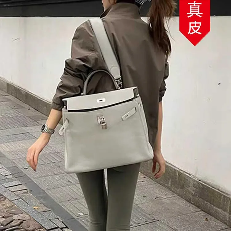 【FEINUO/妃诺】高级感单肩腋下包包女2025斜挎大容量宽肩带凯莉包