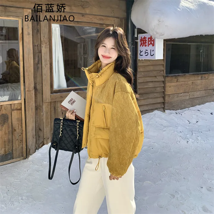 撞色拼接黄色羽绒服女冬季2025新款流行短款小个子爆款加厚韩系