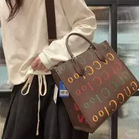 95新 GUCCI/古驰 【蕾】03 1256 棕色字母印花托特包