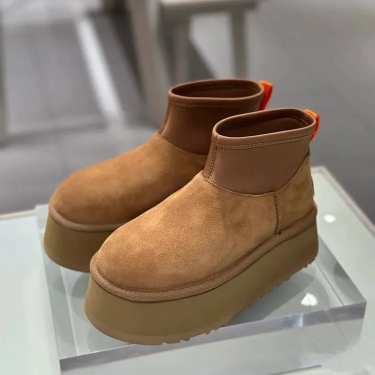 高帮秋冬厚底新款迷你皮毛一体平底铅笔弹力袜筒靴低筒短款雪地靴