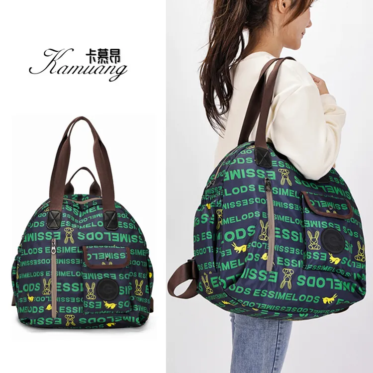 2025春夏新款大容量手提单肩包时尚百搭旅行包休闲旅游妈咪双肩包