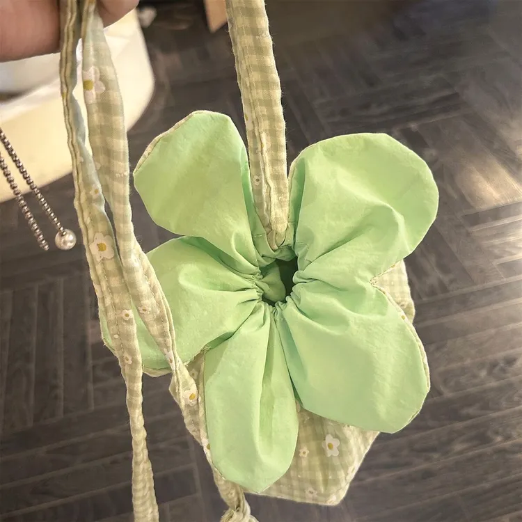 高颜值抽绳花朵包ins收纳袋便携外出简约甜美单肩斜挎小手提女包