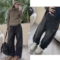 佟掌柜-贴布点点牛仔 高腰欧货磨破显瘦痞帅牛仔裤69199