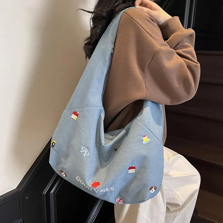 牛仔布包包女大容量2025新款夏天小众设计单肩斜挎包高级感饺子包