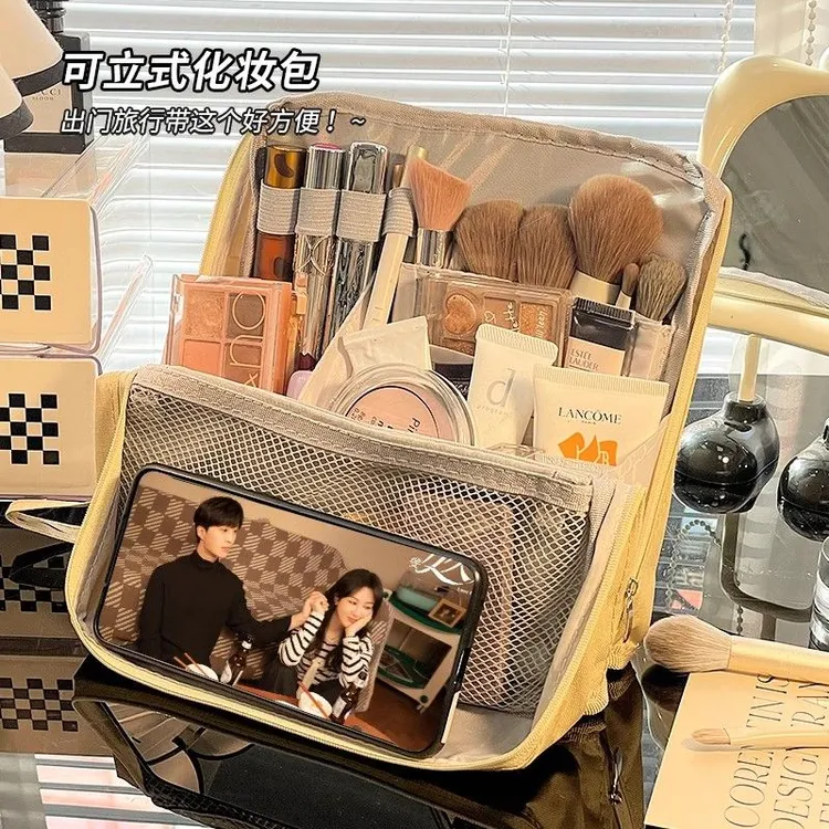 化妆包女2025新款大容量便携式旅行化妆品收纳袋手提分格分隔袋m