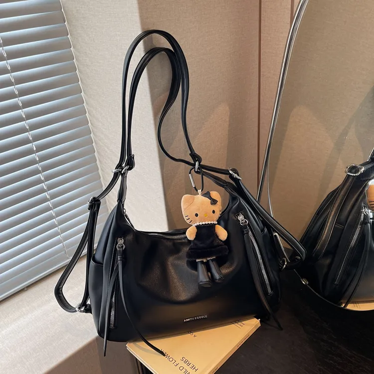 艾米兔女包2025新款大容量双肩包手提纯色小众洋气质感通勤单肩包