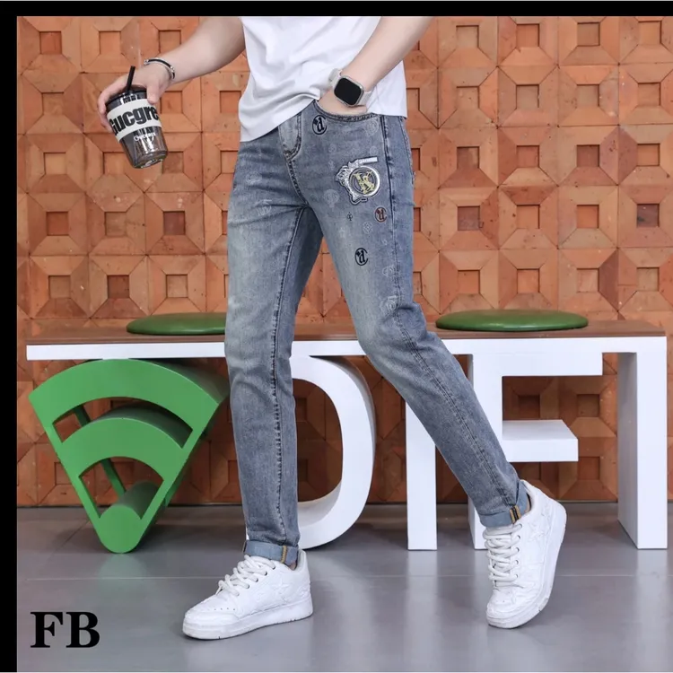 欧洲站春夏新款烫金提花牛仔裤男士潮流个性薄款修身百搭小脚长裤