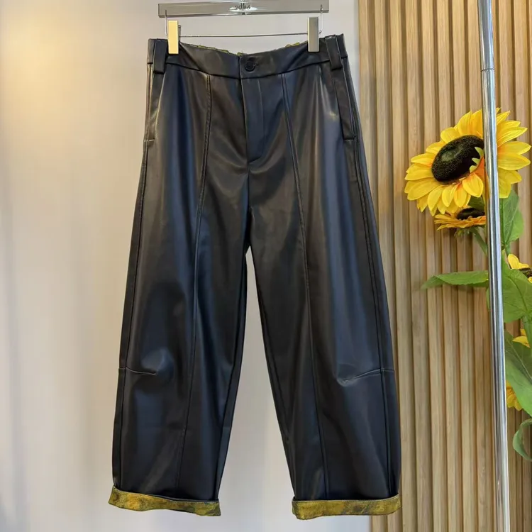 欧洲站2025年重磅提花翻边气场款国潮风前裤线拼接微垮蛋白皮皮裤