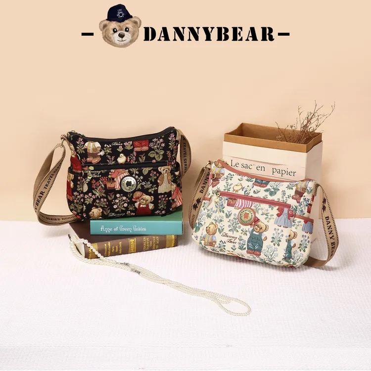 DANNYBEARJEANS单肩斜挎包女包新款小众简约休闲编织轻便布包通勤