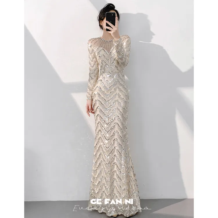 高端晚礼服女2025新款高级感气质年会主持鱼尾亮片连衣裙长袖冬季