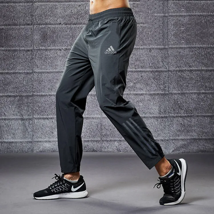 正品阿迪达斯梭织长裤男夏季新款薄款休闲裤运动裤透气裤子HF8986