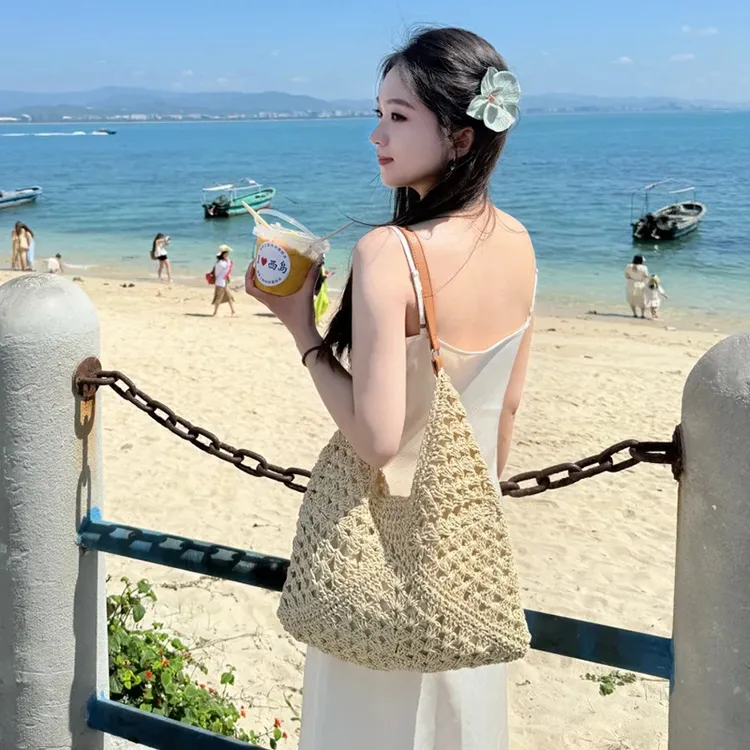 大容量草编包女2025新款夏季海边旅游沙滩包编织镂空单肩托特包