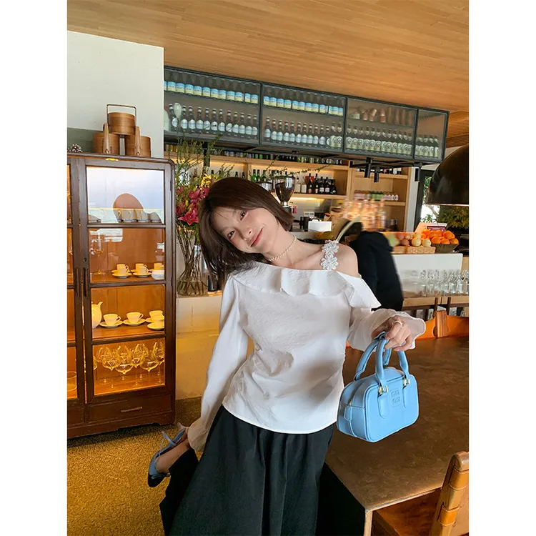 2025春法式浪漫手工立体花斜肩荷叶边收腰长袖衬衫女气质白色