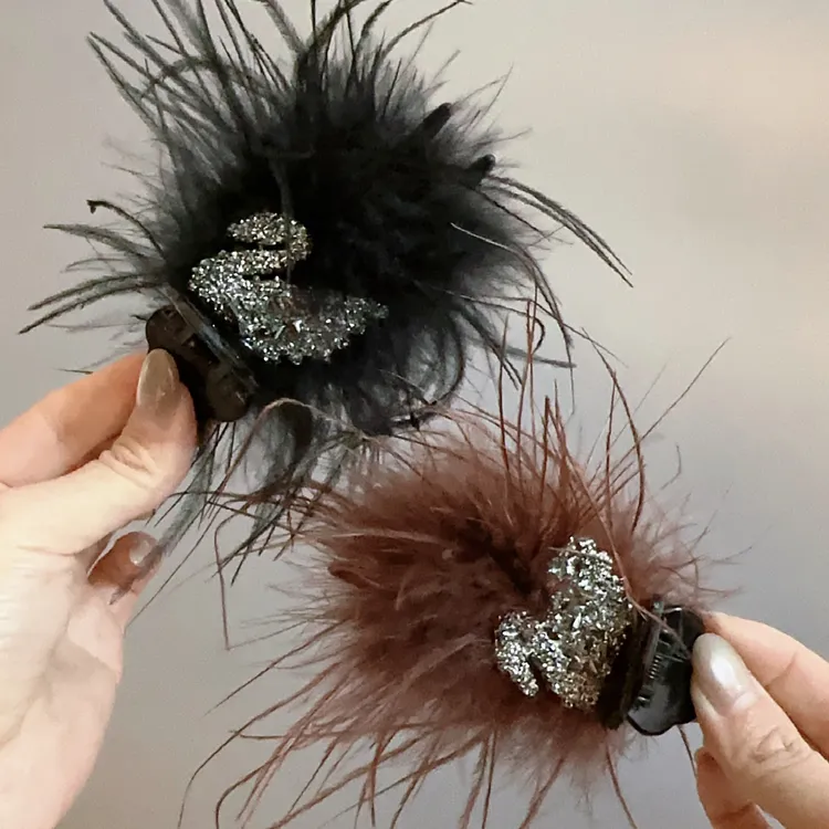 明星同款小天鹅羽毛抓夹发夹优雅气质丸子头丸子夹2025新款发饰