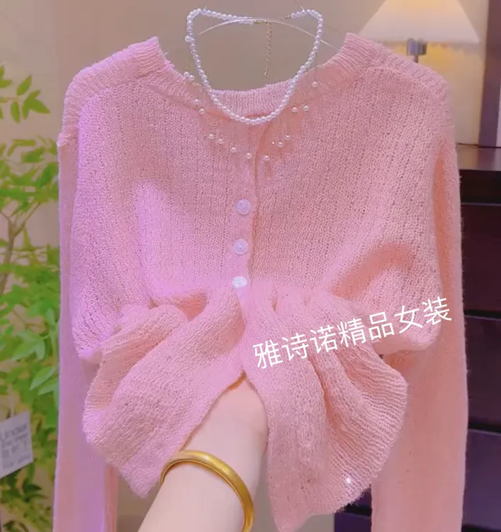 温柔风减龄后背纽扣不规则长袖针织衫女春季新款慵懒风显瘦毛衣潮