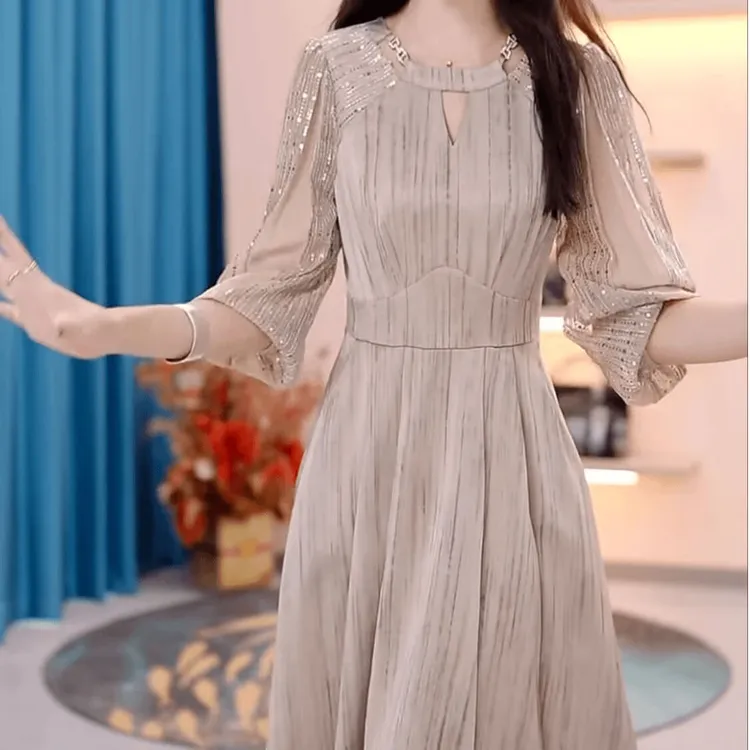 【1101人收藏】时尚洋气九分袖连衣裙2025春秋季修身显瘦遮肚中长款