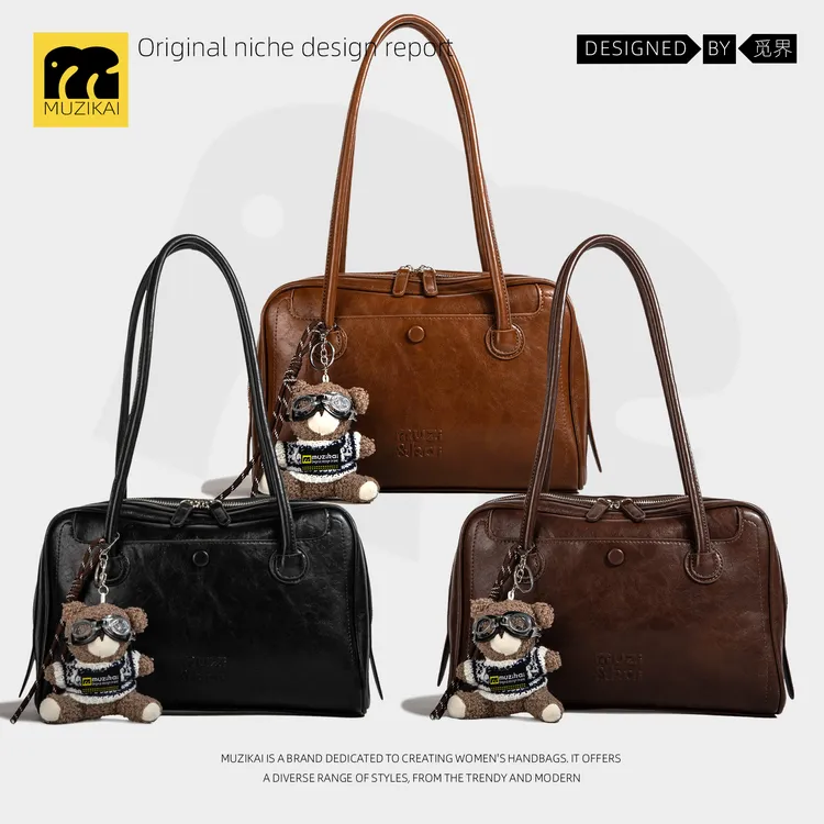 大容量保龄球包包女式2025新款小众高级简约复古通勤单肩公文包