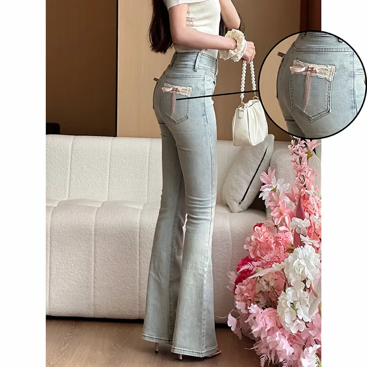 蝴蝶结蕾丝拼接微喇牛仔裤女2025秋季新款弹力提臀显瘦喇叭长裤