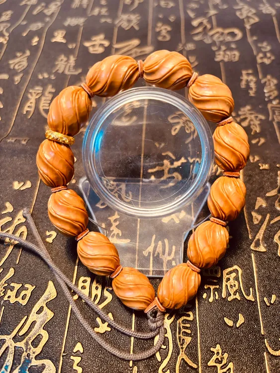 扭转乾坤精品橄榄核手串高端男士手链男款雕刻扭珠文玩手把件