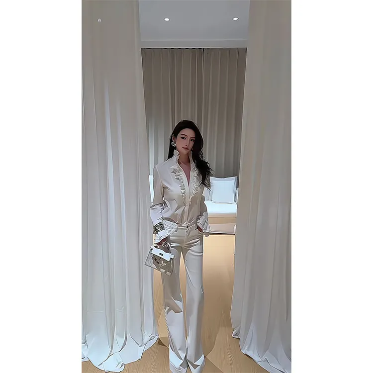 法式白色衬衫女2025新款轻奢独特漂亮巨好看荷叶边上衣高腰微喇裤