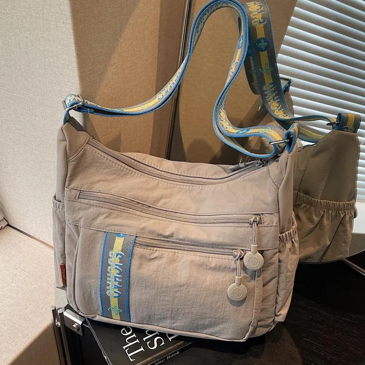 休闲大容量帆布包包女2025新款时尚单肩通勤包简约百搭斜挎托特包