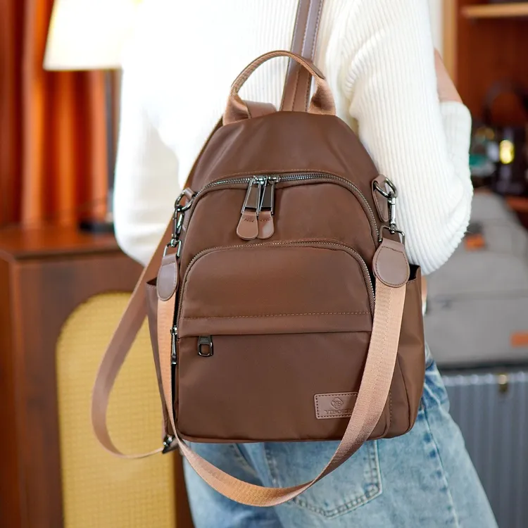 双肩包女2025秋冬新款大容量多隔层女士旅行背包简约百搭防水背袋