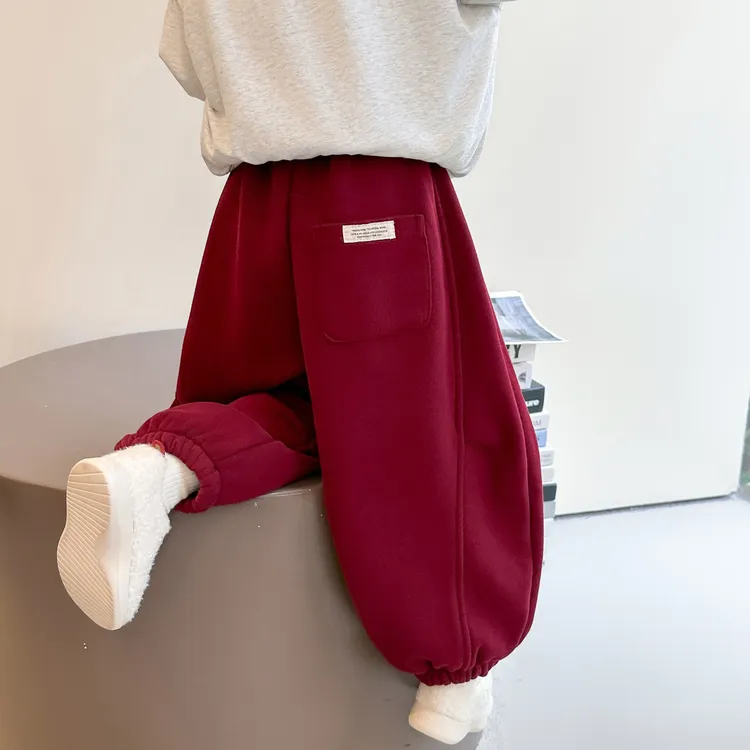 儿童冬季加绒裤子韩版男女童贴标宽松弯刀裤洋气加厚保暖校园卫裤