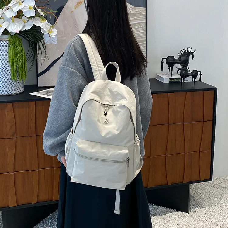 2025新款超轻防泼水双肩包休闲男女旅行大容量背包学生书包