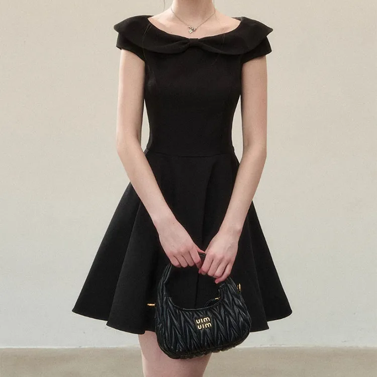 气质一字肩黑色连衣裙夏季新款收腰显瘦法式高级感蓬蓬短裙