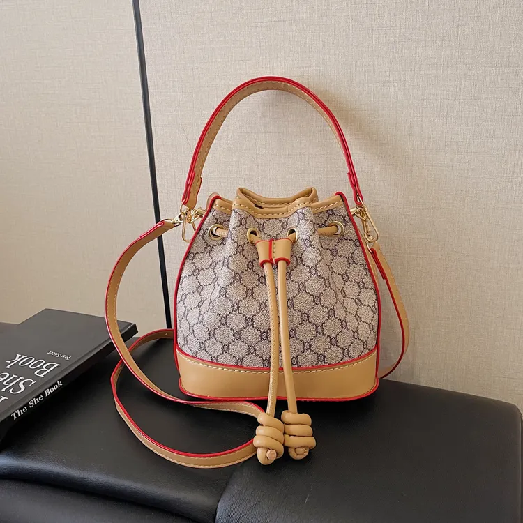 新款抽绳水桶包自制DIY印花单肩韩系不撞款复古小众编织轻奢包包