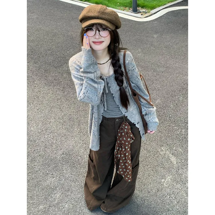 灰色不规则镂空钉珠外搭针织开衫女2025新款早秋季独特超好看上衣
