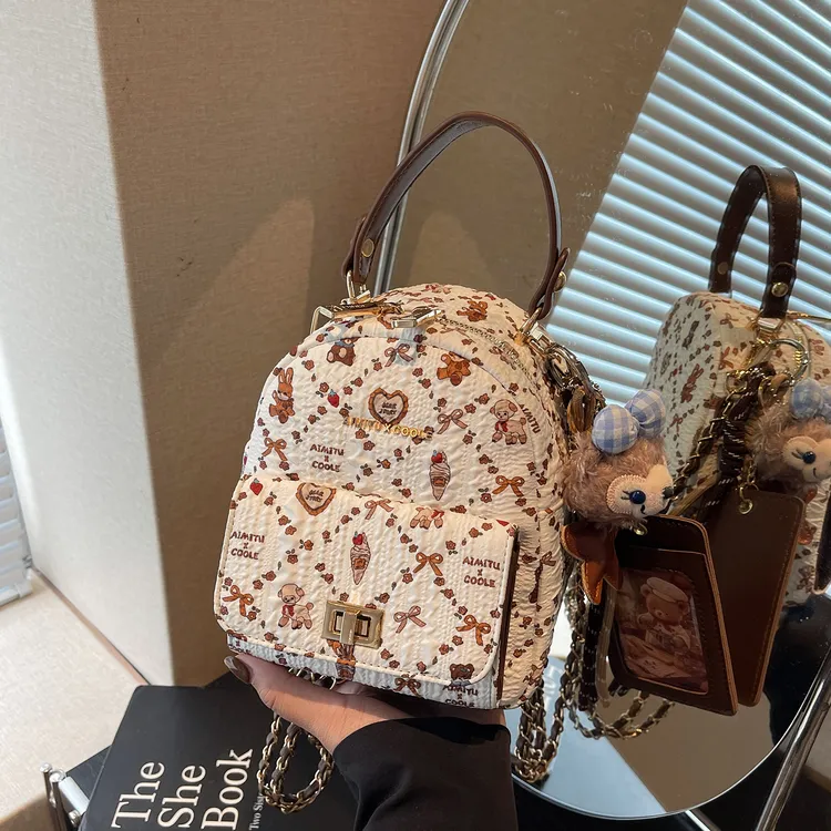 艾米兔女包2025新款简约休闲潮流可爱碎花小众通勤手提双肩链条包
