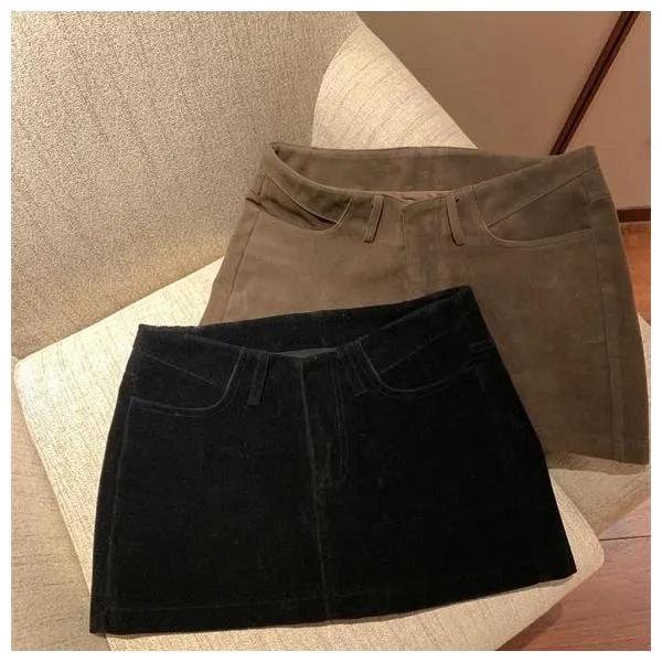 黑色性感辣妹妹弧形腰短裙自带安全裤女春秋高腰显瘦显腿长半身裙