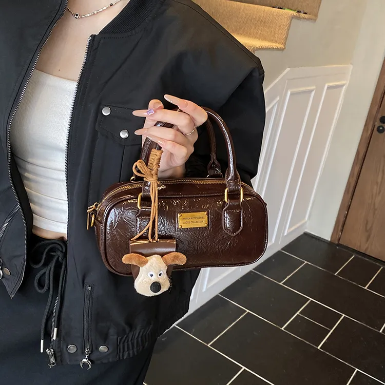 2025秋冬新款单肩斜挎手提包包女大容量复古通勤波士顿棒球枕头包