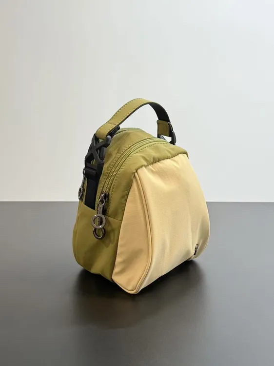 单间斜挎纯色拉链简约风蛋蛋包板栗包斜挎包潮流手拎包防水布包女