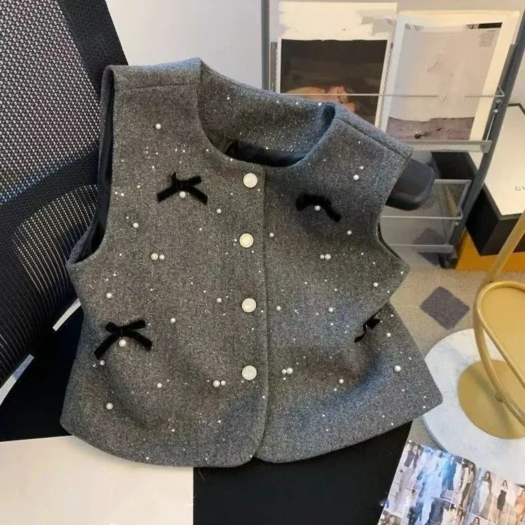 法式洋气小香风毛呢马甲女新款蝴蝶结高级感重工别致背心坎肩上衣