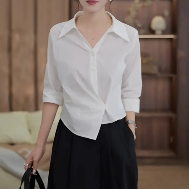 小众设计感翻领白色衬衫女2025早秋新款百搭不规则衬衣七分袖上衣