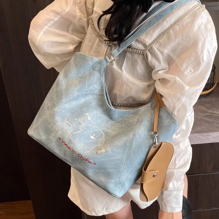 韩国卡通大容量包包女式2025新款潮百搭通勤单肩包上班外出托特包