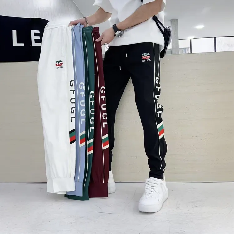 男士2025夏季新款薄款休闲裤束脚修身字母印花刺绣冰丝速干小脚裤