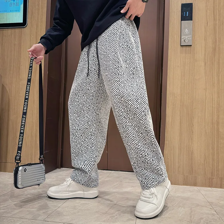 满天星弯刀裤男秋冬款潮流斜条纹直筒宽松男士加绒加厚休闲长裤子